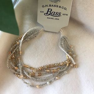 NWT multi strand gold and clear bead bracelet!